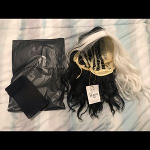 Black and white wavy haired wig with wig cap